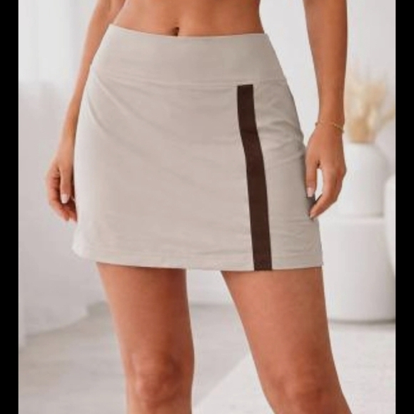 HALARA Dresses & Skirts - HALARA Cream Mini Skirt with Brown Stripe